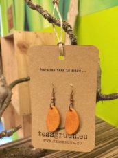 Handmade earrings from alder wood.