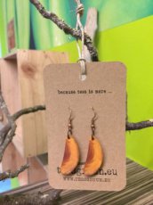 Handmade earrings from apple wood.