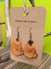 Handmade maple earrings finished with natural product.