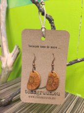 Handmade earrings made of chestnut wood.